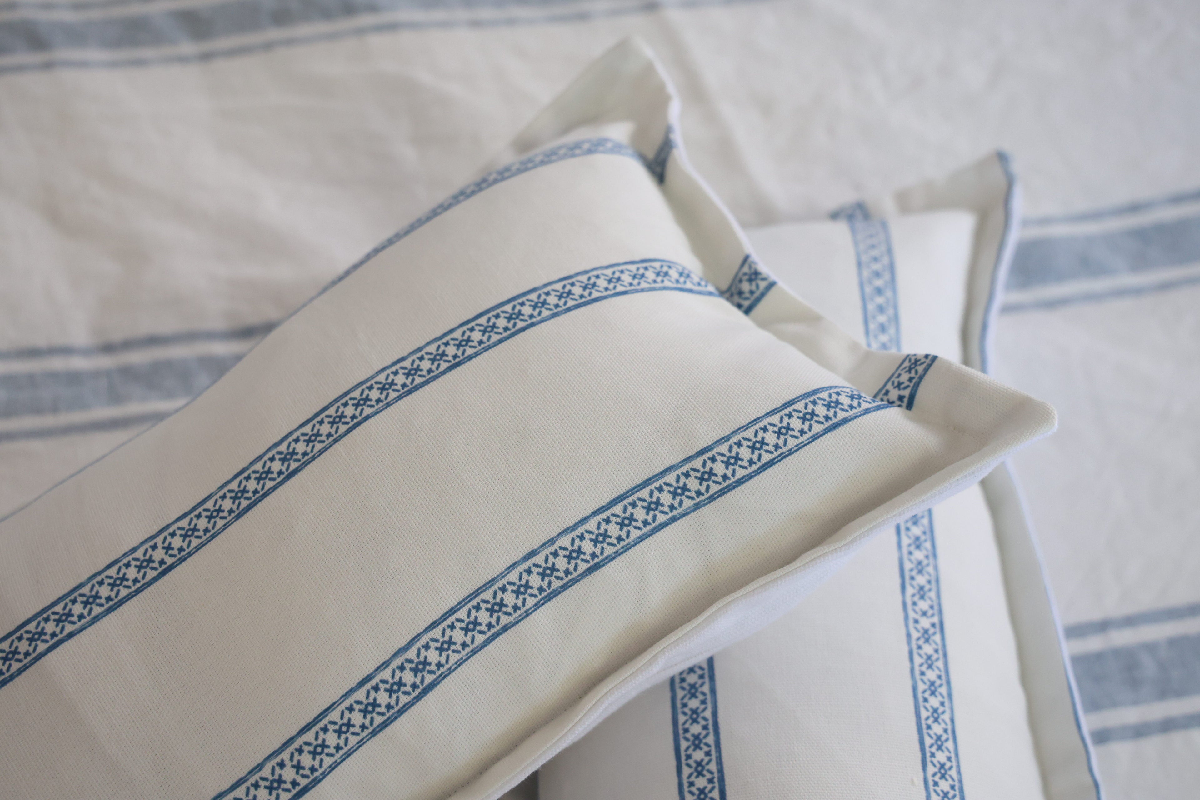 Blue and white stripe cushion